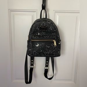 Lounge-fly glow in the dark Mickey Sky black backpack.